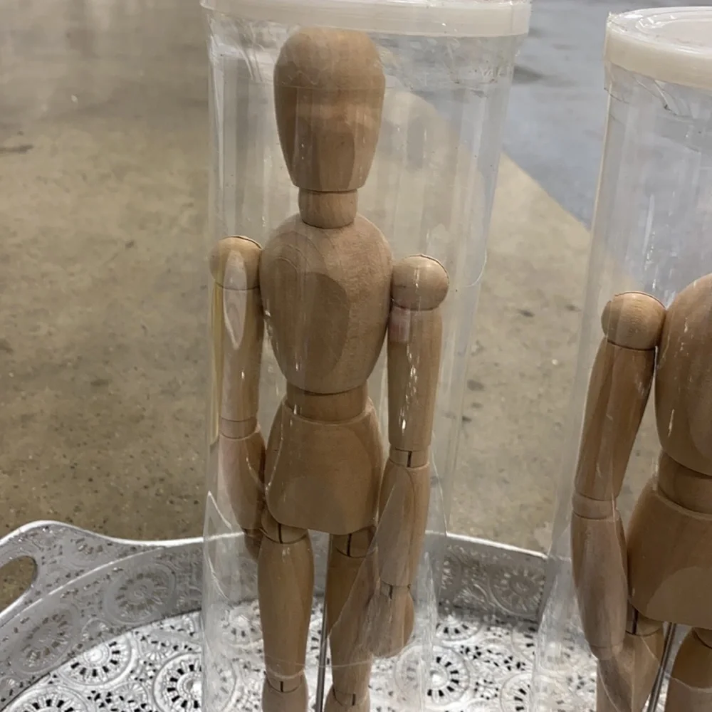Two wooden poseable models From IKEA